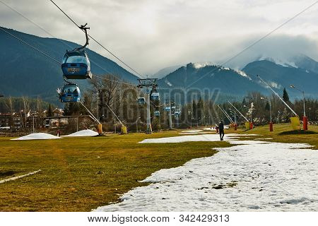 Bansko, Bulgaria - December 27, 2019: Ski Resort Center In Bulgaria. Cableway For Climbing The Mount