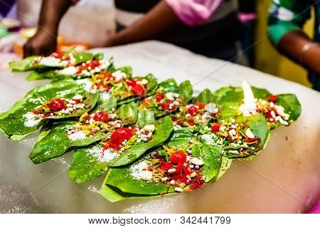 Collection Of Banarasi Paan Betel Leaf With Masala Displayed With Displayed For Sale At A Shop.