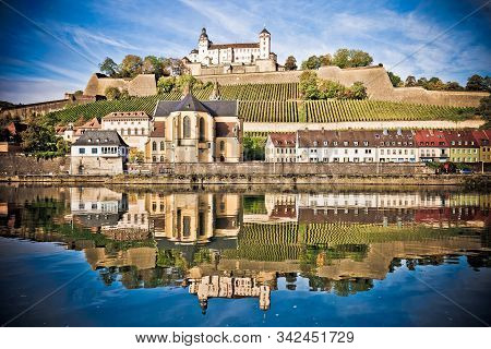Wurzburg. Main River Waterfront And Scenic Wurzburg Castle And Vineyards Reflection View, Bavaria Re