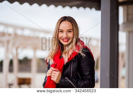 Slylish Trendy Hipseter Girl With Red Kiss Lips In Rock Black Lether Jacket Outdoors In The City