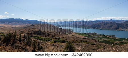 Aerial Panoramic View Of A Small Touristic Town During A Beautiful Sunny Summer Day. Taken In Osoyoo