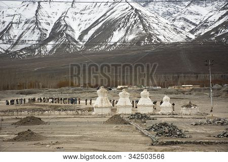 Tibetans People Walking Parade On The Street For Respect Praying Buddha Chag Tsel Style In Tibet Cer
