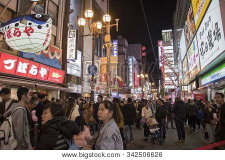 Osaka, Japan- 27 Nov, 2019: Beautiful Landscape View Of Japanese Store With Crowd Of Peoples And Tou
