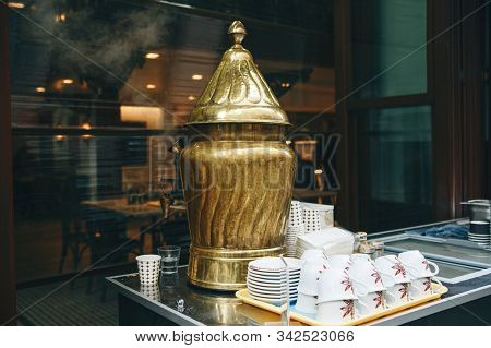Cooking And Selling Traditional Turkish Drink Sahlep Or Salep.