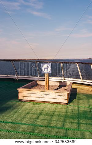 Toilet For Dogs And Other Pets To Make Their Needs On Board A Cruise Ship That Is Sailing