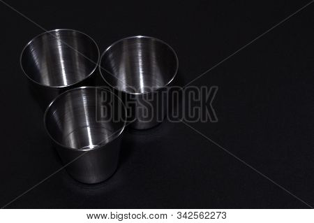 Modern Metal Stainless Steel Inox Glasses For Vodka - For Camping - Isolated On Black.