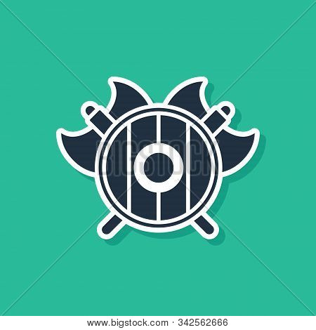 Blue Medieval Shield With Crossed Axes Icon Isolated On Green Background. Battle Axe, Executioner Ax