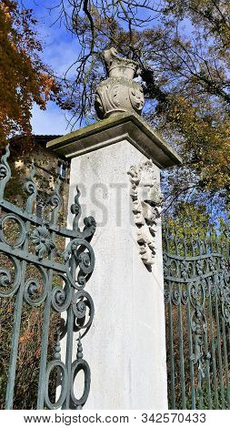Beautiful Long Beige Fence With Lion And Ornaments