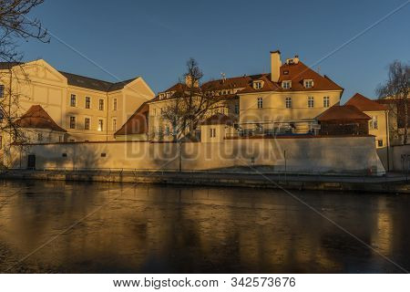 Centre Of Ceske Budejovice City With Old Houses And Towers And Rivers In Sunny Winter Evening