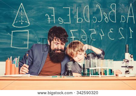 Teacher And Boy Chemical Laboratory. Knowledge Day September Holiday. Basic Level Chemistry Knowledg