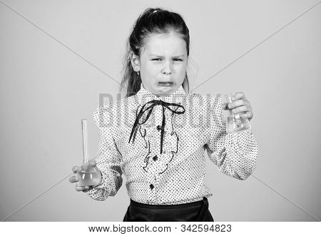 Stressed And Tired Doctor. Small Stressed Girl With Testing Flask. Child Study Bilogy Lesson. Back T