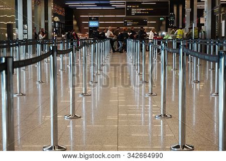 Krakow, Poland 20.12.2019: Black Restrictive Ribbons For Passengers At A Modern Krakow Balice Intern