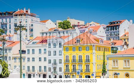 Portugal, Lisbon In Summer, Street Of Lisbon, Beautiful Yellow House Among White Houses In Lisbon, F