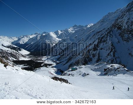 Azau Valley, Mount Elbrus, Russian Federation - Feb, 2010: People Are Skating Skiing On The Slope In