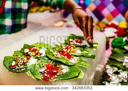 Collection Of Betel Leaf Banarasi Paan And Fire Paan Displayed For Sale At A Shop With Selective Foc