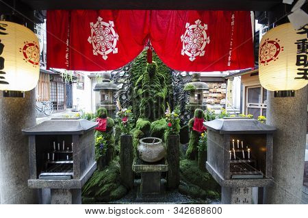 Osaka, Japan- 28 Nov, 2019: Fudo Covered With Moss And Water Washout In Hozenji, Osaka. Hozenji Temp