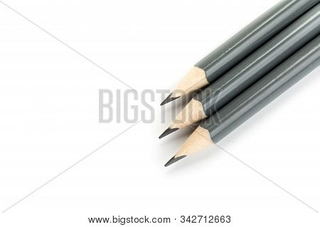 Three  Gray Triangular Pencil Isolated
On White Background