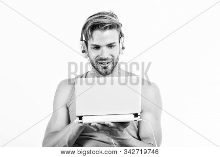Mp3 Player. Sexy Muscular Man Listen Music On Phone Mp3 Player. Man With Mp3 Player On Phone Isolate