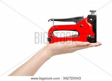 Red Industrial Stapler, Furniture Industry Hardware. Isolated On White.