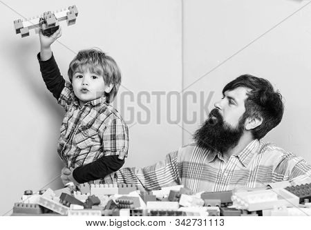 Father Son Game. Father And Son Create Constructions. Bearded Man And Son Play Together. Every Dad A