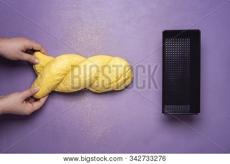 Baking Corn Bread Concept With Woman Molding Yellow Dough Into Corn Bread Over Purple Table. Flat La
