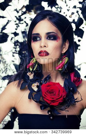 Pretty Brunette Woman With Rose Jewelry, Black And Red, Bright Make Up Kike A Vampire Closeup Red Li