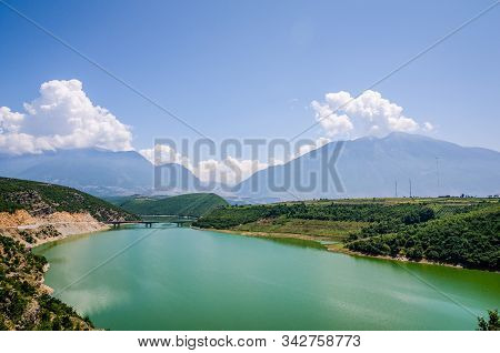 Lake Fierza Near City Kukes In Albania In Summer With Mountains In Background