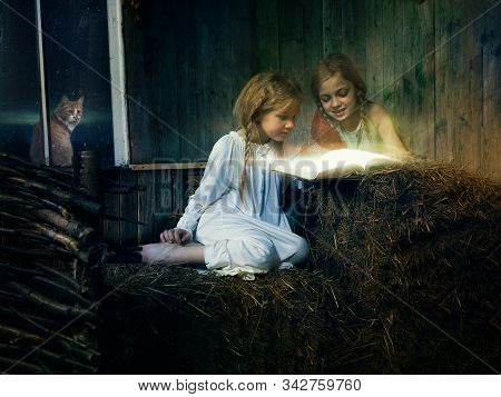 Children Read A Magic Book In Hayloft