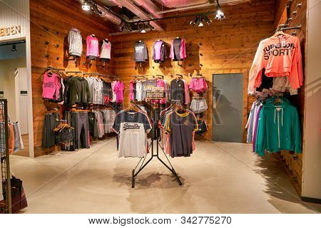 BERLIN, GERMANY - CIRCA SEPTEMBER, 2019: interior shot of Superdry store in Berlin.