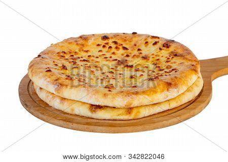 Georgian Traditional Food Khachapuri On A Wooden Dish On White Background.