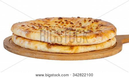 Georgian Traditional Food Khachapuri On A Wooden Dish On White Background.