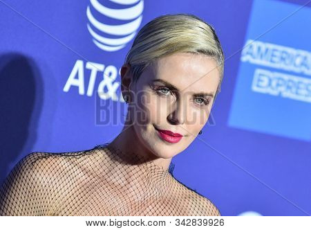 LOS ANGELES - JAN 02:  Charlize Theron arrives for the PSIFF Awards Gala 2020 on January 02, 2020 in Palm Sprimgs, CA                