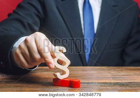 A Man Deals With His Opponent With A Paragraph Figure. Suppression Of Dissatisfaction Disagreement W