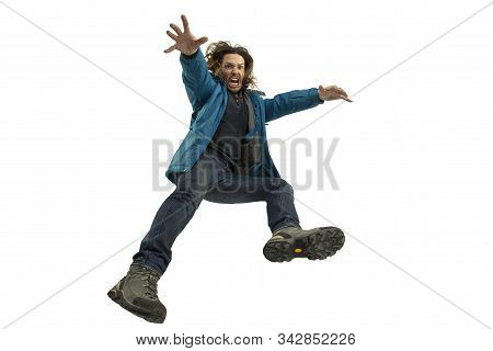 A Second Before Falling. Caucasian Young Man Falling Down In Moment With Bright Emotions And Facial 