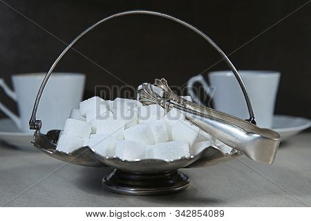 Sugar Cubes In Metal Vintage Sugar  Bowl With Sugar Tongs.