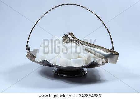 Sugar Cubes In Metal Vintage Sugar  Bowl With Sugar Tongs.
