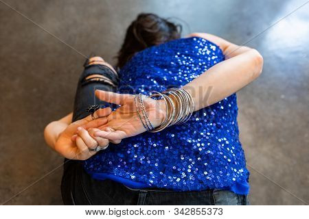 A Close Up And Rear View Of A Lady In An Advanced Marichyasana A Posture During A Vinyasa Flow Yoga 