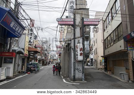 Osaka, Japan- 28 Nov, 2019: People Walking On The Quiet Street In Namba Area During Morning. Namba I
