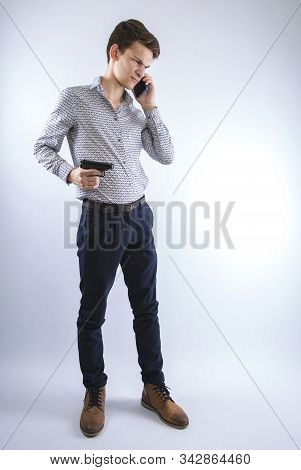 Young Man Broken Over Relationship. Young Man In Depression Commits A Foul Call. Copy Space
