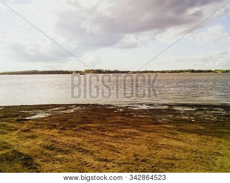 The Sandy Shore Of The River. Northern Rivers Of Siberia
