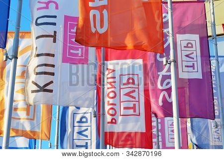 Warsaw,poland 10 May 2016. Flags Flapping In The New Headquarters Of Tvp In Warsaw.