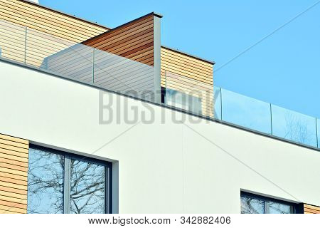 Contemporary Residential Building Exterior In The Daylight. Modern Apartment Buildings On A Sunny Da