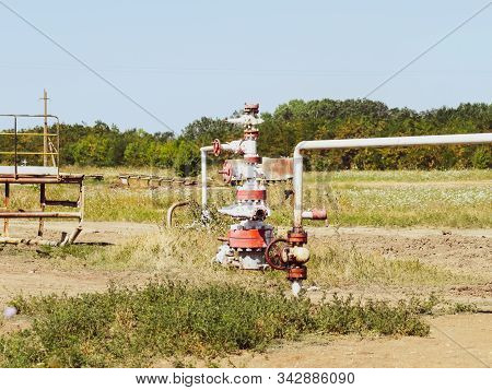 Well For Oil And Gas Production. Oil Well Wellhead Equipment. Oil Production.