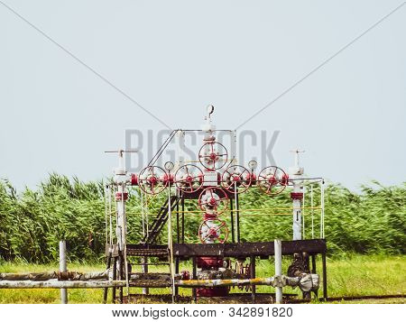 Wells In The Kuban. Extraction Of Hydrocarbons. Well For Oil And Gas Production. Oil Well Wellhead E