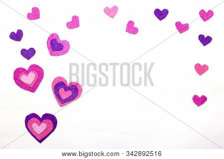 White Background. Red, Pink, Vilolet Felt Hearts. Copy Space. Place For Text And Design. Valentines 