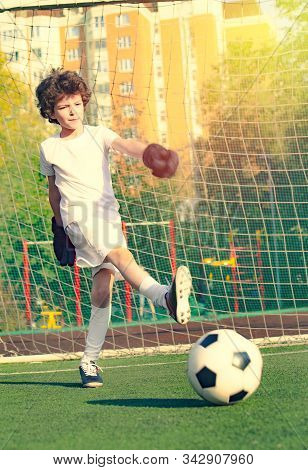 Childrens Soccer Football - A Match Of Young Children On The Football Field