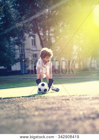 Childrens Soccer Football - A Match Of Young Children On The Football Field