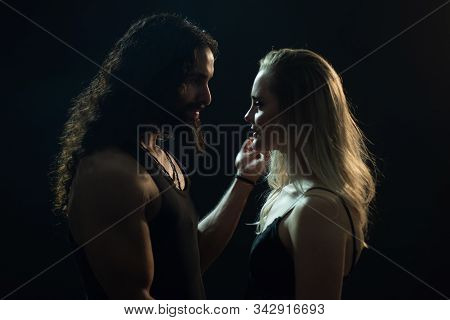 Sensual Elegant Couple In The Tender Passion. Handsome Man Touching Womans Face. Romantic Couple Sta