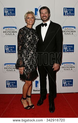 NEW YORK - SEPTEMBER 27: Martin Truex Jr (R) and wife Sherry Pollex attend the 2016 NASCAR Foundation Honors Gala at Marriott Marquis on September 27, 2016 in New York City.