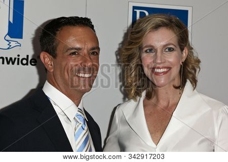 NEW YORK - SEPTEMBER 27: Mike Massaro (L) and Krista Voda attend the 2016 NASCAR Foundation Honors Gala at Marriott Marquis on September 27, 2016 in New York City.